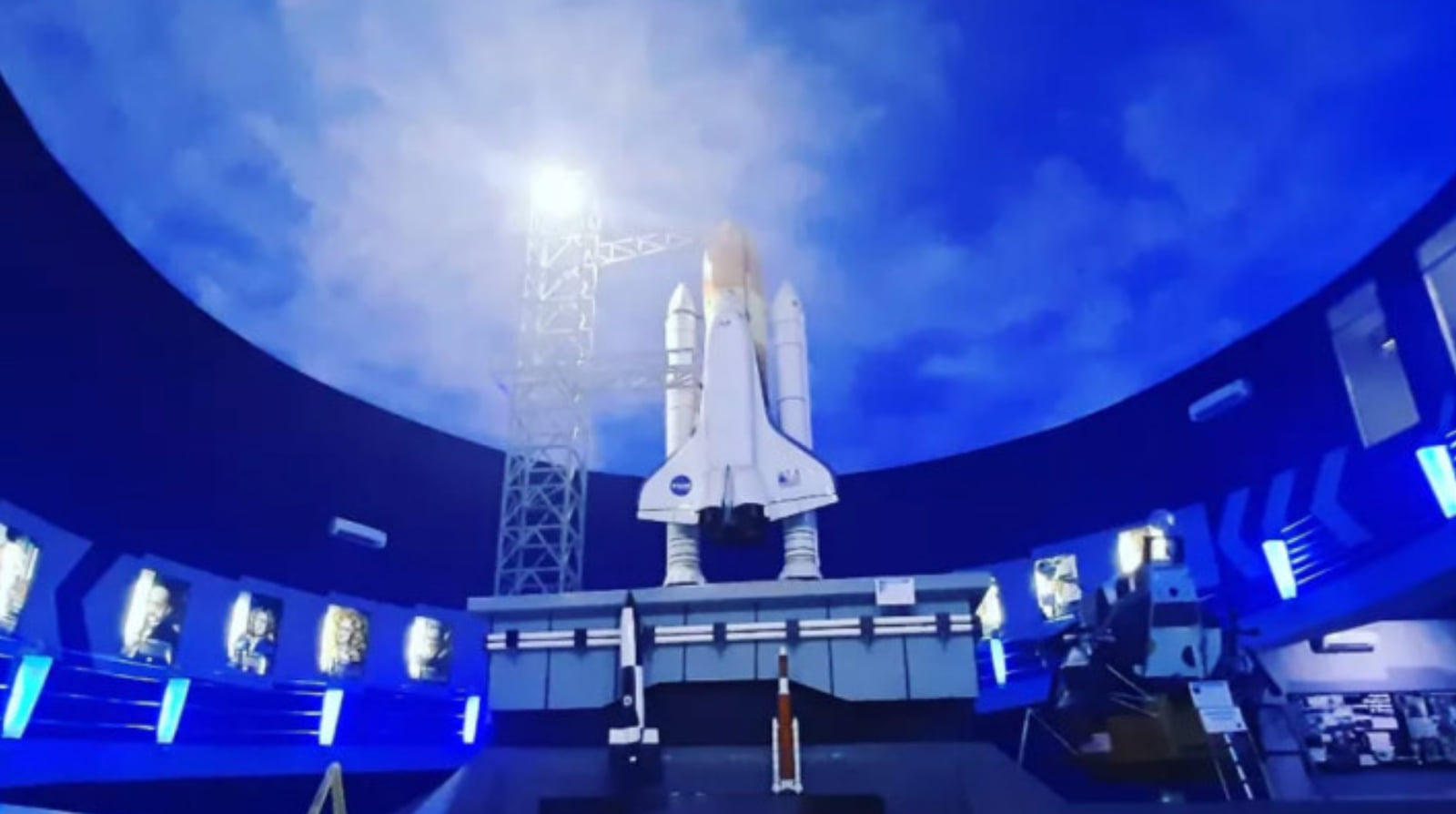 A space shuttle model standing beneath the projection dome at the Jakarta Planetarium