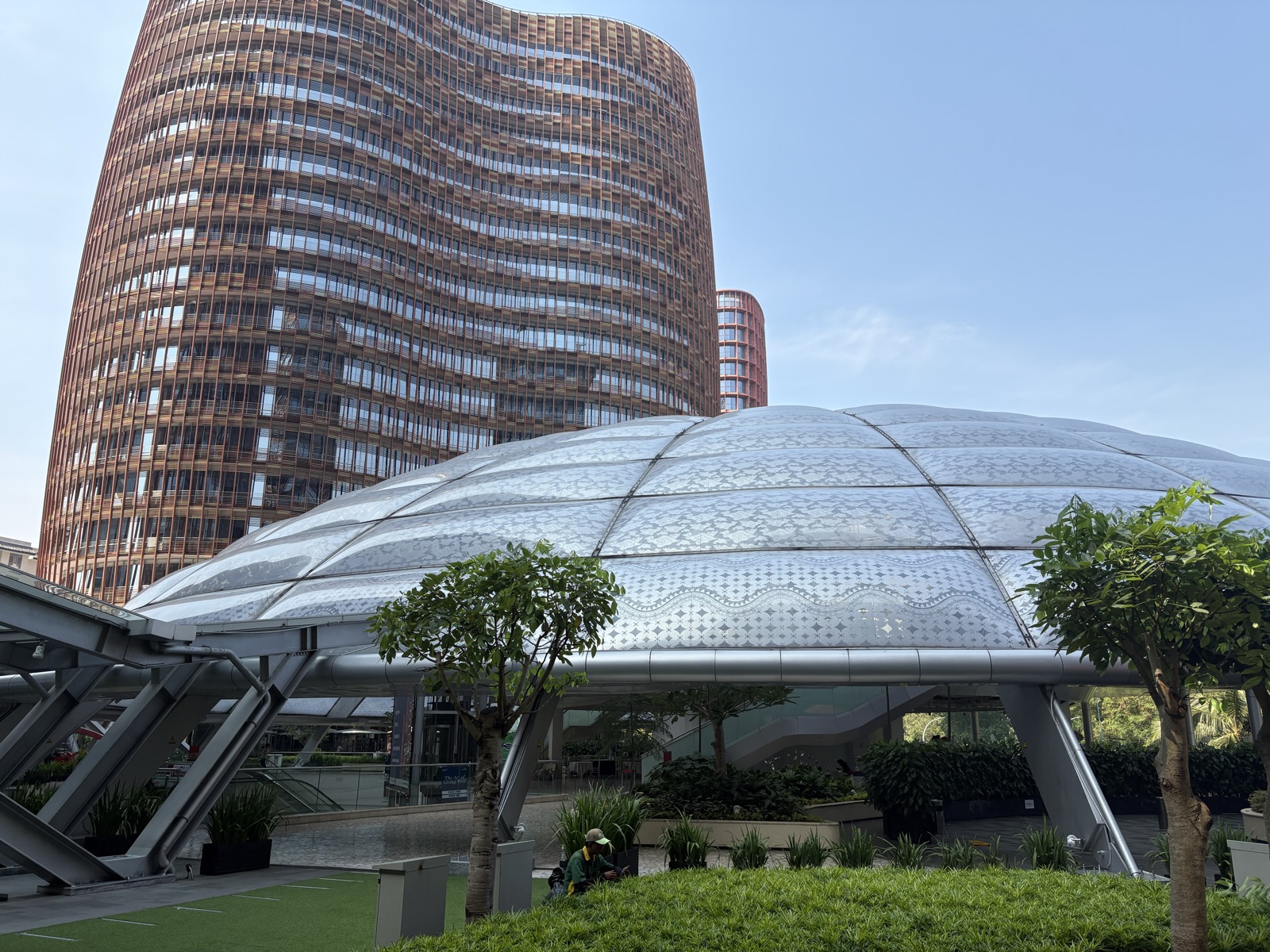 South Quarter's glass dome plaza and copper-clad towers in South Jakarta
