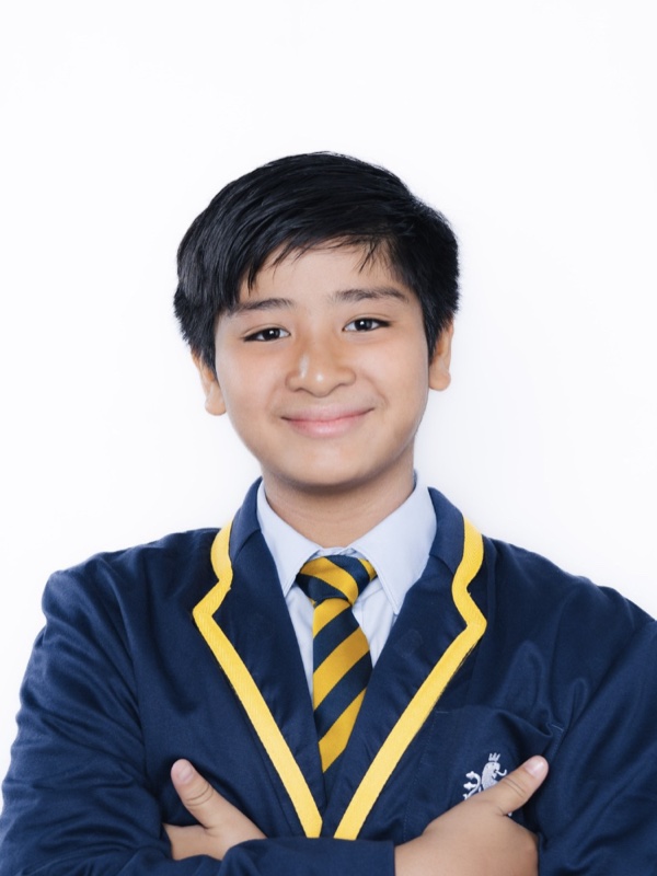 An ISJ pupil in school uniform