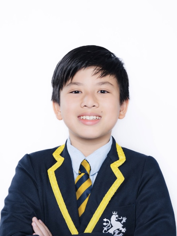 An ISJ pupil in school uniform