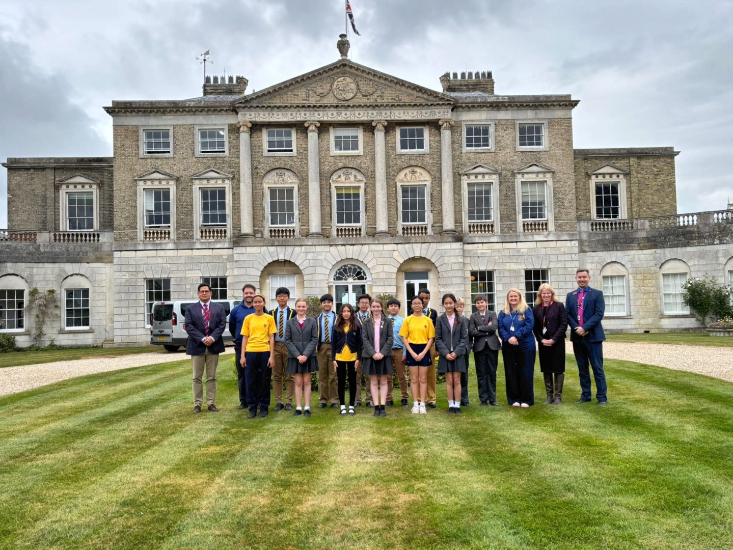 ISJ Year 7 and 8 pupils with staff in front of Woolverstone Hall, Ipswich High School, Suffolk